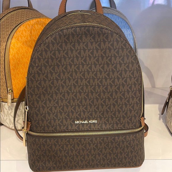 Michael Kors Handbags - MICHAEL KORS Rhea Medium Zip Signature Logo Backpack
BROWN 
NWT